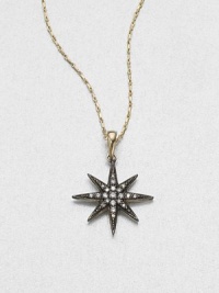 Twinkle, twinkle, diamond star, this starburst-shaped pendant of oxidized sterling silver hangs from a graceful 14k gold chain.Diamonds, .12 tcwSterling silver and 14k yellow goldChain length, about 16Pendant diameter, about ¾Spring ring claspMade in USA Twinkle, twinkle, diamond star, this starburst-shaped pendant of oxidized sterling silver hangs from a graceful 14k gold chain.Diamonds, .12 tcwSterling silver and 14k yellow goldChain length, about 16Pendant diameter, about ¾Spring ring claspMade in USA