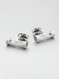 Brass cuff links with an hour glass accent lends an unexpected flair to a timeless wardrobe essential.Brass/sandAbout ¼ diam.Made in the United Kingdom Brass cuff links with an hour glass accent lends an unexpected flair to a timeless wardrobe essential.Brass/sandAbout ¼ diam.Made in the United Kingdom