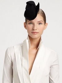A tiny, sculptural felt fedora is utterly on-trend this season.FeltMade in UK A tiny, sculptural felt fedora is utterly on-trend this season.FeltMade in UK
