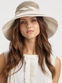 This colorblocked, yet neutral design features an external, adjustable tie and removable inner band. CottonBrim, about 4¼Removable inner bandCotton linedHand washImported This colorblocked, yet neutral design features an external, adjustable tie and removable inner band. CottonBrim, about 4¼Removable inner bandCotton linedHand washImported