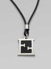Leather cord necklace is accented by an iconic initial pendant of metal and leather.Metal/leatherAbout 1¼ x ½Necklace, about 23 longMade in Italy