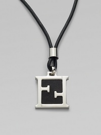 Leather cord necklace is accented by an iconic initial pendant of metal and leather.Metal/leatherAbout 1¼ x ½Necklace, about 23 longMade in Italy Leather cord necklace is accented by an iconic initial pendant of metal and leather.Metal/leatherAbout 1¼ x ½Necklace, about 23 longMade in Italy