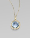 From the Lollipop Collection. A beautifully colored faceted blue topaz, framed in diamonds, hangs from a graceful 18k gold chain. Blue topaz Diamonds, 0.14 tcw 18k yellow gold Chain length, about 16 with 2 extender Pendant diameter, about ½ Spring ring clasp Imported