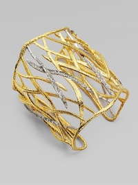 From the Elements Collection. A pretty crystal accented cuff with elegant woven leaves. Swarovski crystalsGoldtoneRhodium-platedLength, about 6½ adjustableSlip-on styleImported