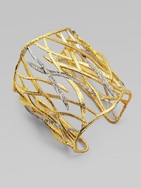 From the Elements Collection. A pretty crystal accented cuff with elegant woven leaves. Swarovski crystalsGoldtoneRhodium-platedLength, about 6½ adjustableSlip-on styleImported From the Elements Collection. A pretty crystal accented cuff with elegant woven leaves. Swarovski crystalsGoldtoneRhodium-platedLength, about 6½ adjustableSlip-on styleImported