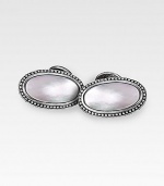 Pristine mother-of-pearl stones offset the darker hues of finely engraved sterling silver. About 1 X ½ Made in USA