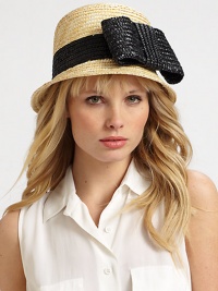 This sweet design showcases a large, whimsical bow. StrawBrim, about 2Cotton linedClean with damp clothMade in Italy This sweet design showcases a large, whimsical bow. StrawBrim, about 2Cotton linedClean with damp clothMade in Italy