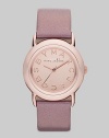 Smart and chic style with leather strap. Quartz movement Water resistant to 5 ATM Round ion-plated rose gold stainless steel case, 33mm (1.3) Rose gold mirror logo dial Second hand Metallic blush leather strap, 18mm wide (0.7) Imported 