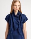 Beads adorn the ends of this whisper silk scarf for year-round-styleSilkBead details27 X 44Imported