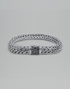 Signature John Hardy oval chain bracelet in crafted in sterling silver with black sapphire clasp. 8½ long Handmade in Bali