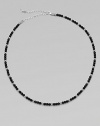 A single strand of black onyx beads and sterling silver stations makes a modern statement.Sterling silverOnyxAbout 19½ long with 4½ extenderLobster claspImported