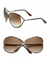 Sleek metal frames in a chic crossover design. Available in shiny bronze with bronze gradient lens,. Logo etched lens100% UV protectionMade in Italy 