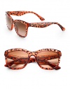Be the cat's meow in these leopard-printed plastic frames. Available in orange frames with brown gradient lenses or leopard with brown gradient lens.Plastic temples with gold logo100% UV ProtectionMade in Italy 