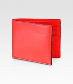 A familiar design crafted in slim-lined, smooth leather featuring two pocket sleeves and a herringbone lining for a cool contrast.One billfold compartmentSix card slotsLeather4 x 4Imported