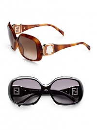 Clean and classic plastic frames adorned with a Janus head detail on temple. Available in light havana with brown gradient lens or black with grey gradient lens.100% UV protection Made in Italy Clean and classic plastic frames adorned with a Janus head detail on temple. Available in light havana with brown gradient lens or black with grey gradient lens.100% UV protection Made in Italy