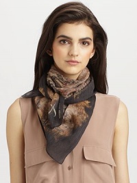 A smooth, wool and silk blend style with an intricate, legendary print.About 34 X 3762% wool/38% silkDry cleanImported A smooth, wool and silk blend style with an intricate, legendary print.About 34 X 3762% wool/38% silkDry cleanImported