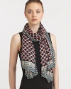 A woven modal scarf is embellished with a colorful print with contrasting border.ModalAbout 65 X 46Dry cleanImported