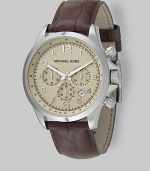 Superior style in stainless steel with heritage-inspired chronograph detail on an embossed leather strap. Quartz movement Water-resistant to 10 ATM Stainless steel case Round case; 44mm diameter (1.73) Three chronograph sub dials Arabic numerals and hour markers Date display at 4:00 Second hand Embossed leather strap Imported 