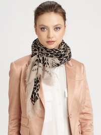 A lightweight modal wrap with a bold animal print and eyelash fringe.ModalAbout 53 X 71Dry cleanImported A lightweight modal wrap with a bold animal print and eyelash fringe.ModalAbout 53 X 71Dry cleanImported