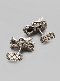 An intricately detailed cosmic dragon in silver. About 1 long Torpedo back Made in Bali An intricately detailed cosmic dragon in silver. About 1 long Torpedo back Made in Bali