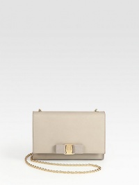 A demure flap-front silhouette crafted from rich leather, adorned with a chain strap and petite grosgrain bow.Shoulder strap, 23 dropFlap and snap closureOne inside open pocketFully lined7W X 5H X 1¾DMade in Italy A demure flap-front silhouette crafted from rich leather, adorned with a chain strap and petite grosgrain bow.Shoulder strap, 23 dropFlap and snap closureOne inside open pocketFully lined7W X 5H X 1¾DMade in Italy