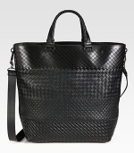 Iconic woven leather tote with adjustable shoulder strap for comfortable cross-body wear.Magnetic snap button closureTop handleAdjustable shoulder strapFully lined12¾W x 14½H x 6½DMade in Italy