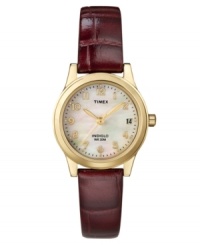 Rich leather and luminous mother-of-pearl distinguish this feminine watch by Timex. Burgundy croc-embossed leather strap and round gold tone mixed metal case. Mother-of-pearl dial features applied goldtone numerals and dot markers, black minute track, date window at three o'clock, gold tone hands, and logo. Quartz movement. Water resistant to 30 meters. One-year limited warranty. Rich leather and luminous mother-of-pearl distinguish this feminine watch by Timex. Burgundy croc-embossed leather strap and round gold tone mixed metal case. Mother-of-pearl dial features applied goldtone numerals and dot markers, black minute track, date window at three o'clock, gold tone hands, and logo. Quartz movement. Water resistant to 30 meters. One-year limited warranty.