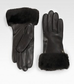 A soft, dyed shearling cuff and luxurious cashmere lining help make this leather style a cold weather essential. About 9 longSpecialist dry cleanImportedFur origin: Spain