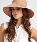 Wide brim cotton organdy with pleated crown and split back brim is perfect for travel or a day at the beach.Adjustable drawstring ties One size fits most Brim, about 4 wide Cotton; dry clean Imported 