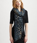 Fashion goes wild on this elegant, edgy wool and cashmere-blend scarf with an eye-catching leopard print.70% wool/30% cashmereAbout 55 X 70Dry cleanMade in Italy