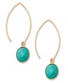 Tried and true, turquoise is an undying trend. Studio Silver's pretty drop earrings feature oval-cut simulated turquoise in 18k gold over sterling silver. Approximate drop: 2 inches.