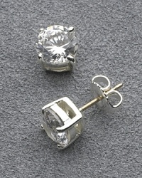 Carolee dazzling round cubic zirconia stud earrings set in sterling silver. Gold post backing. 7mm. Carolee dazzling round cubic zirconia stud earrings set in sterling silver. Gold post backing. 7mm.