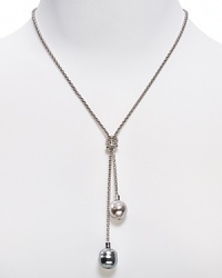 Single strand lariat chain necklace from Majorica with love knot and two opaque beads. Single strand lariat chain necklace from Majorica with love knot and two opaque beads.