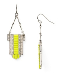 Electric shades are a bright way to accent every look, and these neon earrings from Aqua are wholly head-turning. We love this pair's chunky look - rock them against a neutral palette for a color-pop contrast. Electric shades are a bright way to accent every look, and these neon earrings from Aqua are wholly head-turning. We love this pair's chunky look - rock them against a neutral palette for a color-pop contrast.