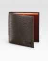 Slim design crafted in Italy from pebbled Italian leather, highlights a side profile with a bold, contrasting interior and plenty of slots to keep your cards neatly secured.One billfold compartmentEight card slotsLeather4W x 3HMade in Italy