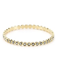 Twinkling hematite colored stones orbit around this gleaming MARC BY MARC JACOBS bangle. It's so spot on. Twinkling hematite colored stones orbit around this gleaming MARC BY MARC JACOBS bangle. It's so spot on.