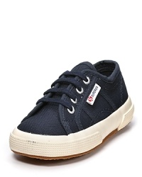 With classic styling, rugged canvas and stable rubber soles, these cool Superga sneakers are a parents' favorite around the world. With classic styling, rugged canvas and stable rubber soles, these cool Superga sneakers are a parents' favorite around the world.