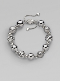 From the Elements Collection. An eclectic mix of smooth and textured sterling silver with an adjustable bead clasp.Sterling silver Length, about 7½ Adjustable oval bead clasp Imported From the Elements Collection. An eclectic mix of smooth and textured sterling silver with an adjustable bead clasp.Sterling silver Length, about 7½ Adjustable oval bead clasp Imported