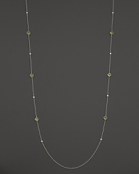 Bezel set diamonds and peridot stones in a sterling silver chain. From Ippolita. Bezel set diamonds and peridot stones in a sterling silver chain. From Ippolita.