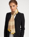Bold stripes adorn a sumptuous silk wrap with logo detail and eyelash fringe.Silk23 X 71Dry cleanImported