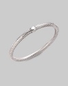 From the Primavera Collection. A basketwoven design in 18K white gold with a single bead accent.18K white gold Diameter, about 65mm, (2.56) Made in Italy