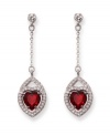 Timeless and romantic, Swarovski's silver tone mixed metal pierced earrings add feminine elegance to any outfit. The Siam crystal hearts and clear crystal pavé sparkle in classic, festive colors. Approximate drop: 1-7/8 inches.