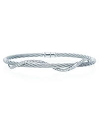 A twist of diamonds and white gold winds around stainless steel bangle. By Charriol. A twist of diamonds and white gold winds around stainless steel bangle. By Charriol.