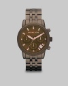 This sleek, modern style with Swarovski crystal markers is truly a dark delight. Quartz movementWater resistant to 10 ATMRound espresso ion-plated stainless steel case, 36mm (1.4) Textured bezelEspresso chronograph dialCrystal hour markersDate display between 4 and 5 o'clockSecond hand Espresso ion-plated stainless steel link braceletImported