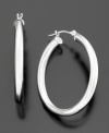 Go for glam with these glistening hoops of 14k white gold. Earrings measure approximately 1 inch in diameter.