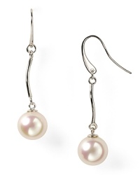 Luminous and versatile. Pearls are always a classic, and this pair of drop earrings from Majorica is a delicate way to wear them. Luminous and versatile. Pearls are always a classic, and this pair of drop earrings from Majorica is a delicate way to wear them.