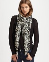 A striking ikat print refreshes this lengthy, lightweight scarf. ViscoseAbout 60 X 60Dry cleanImported