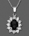 Shining with excellence, this 14k white gold pendant features onyx (5/3 mm) and round-cut diamond accents. Approximate length: 18 inches. Approximate drop: 1 inch.