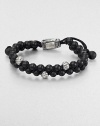 From the Spirited Bead Collection, this two-row beaded bracelet is handsomely crafted from 6mm black onyx beads, featuring three sterling silver cable beads and an adjustable clasp.Sterling silverBlack onyxAbout 9 longAbout 3 diam.Imported