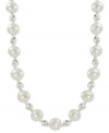 Cultured freshwater pearls (8-8-1/2 mm) blend with rhodium-plated sparkle beads on this sterling silver necklace as the classic look gets a contemporary touch. Approximate length: 18 inches.